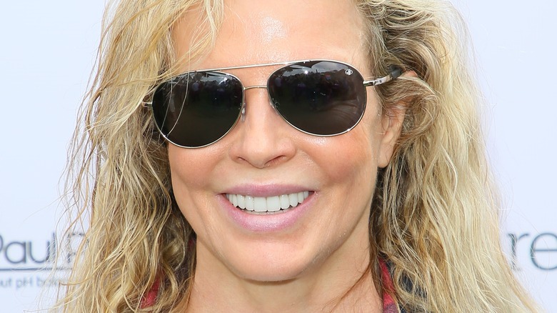 Kim Basinger wearing sunglasses