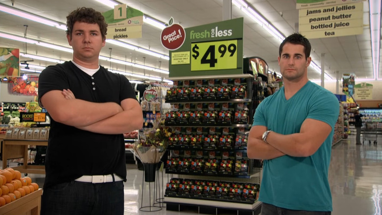 Dallas and Mike standing in grocery store