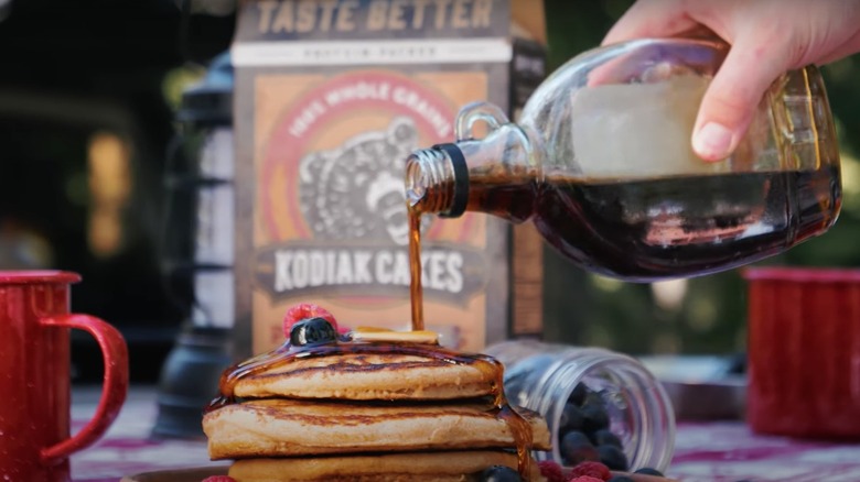 Syrup poured on Kodiak Cakes pancakes