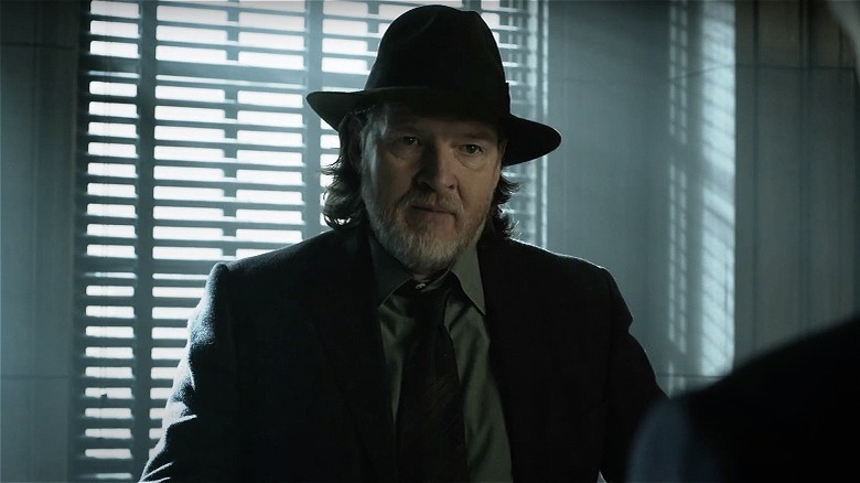 Harvey Bullock in front of a window