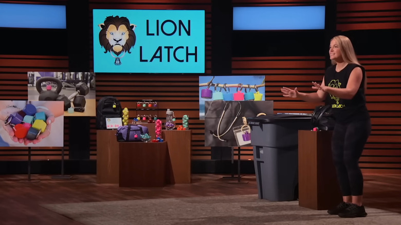 Lerin speaking next to Lion Latch display