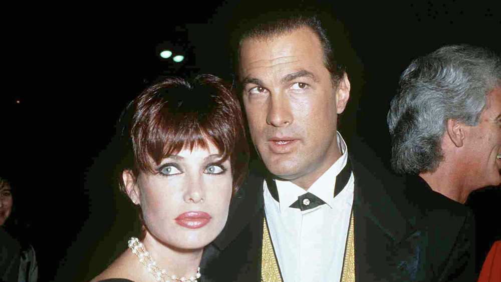 Kelly LeBrock with Steven Seagal on a red carpet