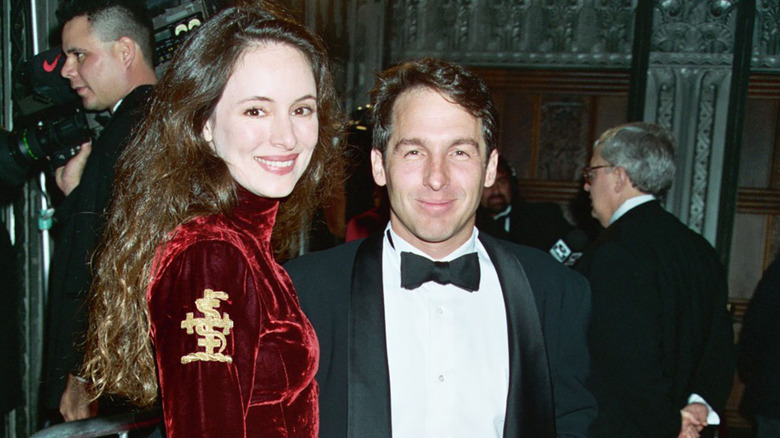 Madeleine Stowe and Brian Benben stand together