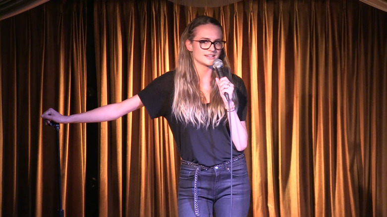 Madison Riley doing stand-up comedy