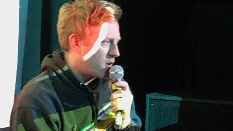 Michael C. Maronna with microphone