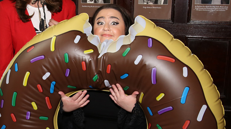 Nikki Blonsky in a donut