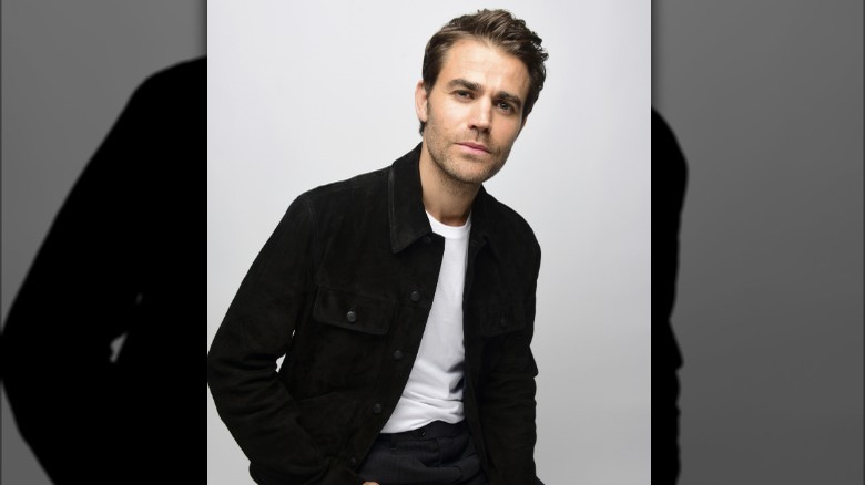 Paul Wesley posing in a studio