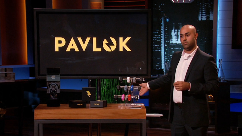 Maneesh pointing towards Pavlok display