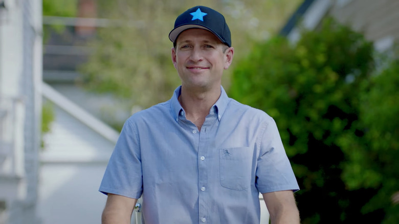 ﻿Tyler Jay smiling wearing hat