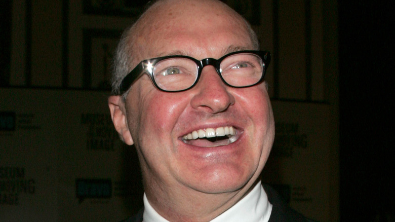 Randy Quaid wearing glasses