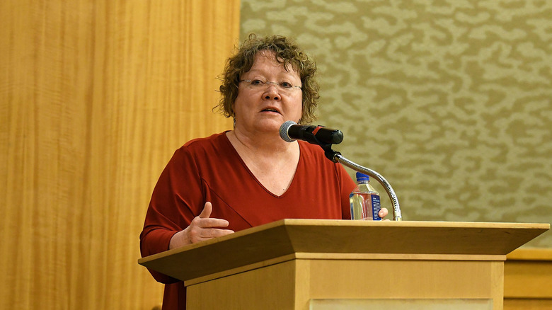 S.E. Hinton talking at a podium