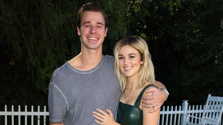 Christian Huff stands with Sadie Robertson Huff