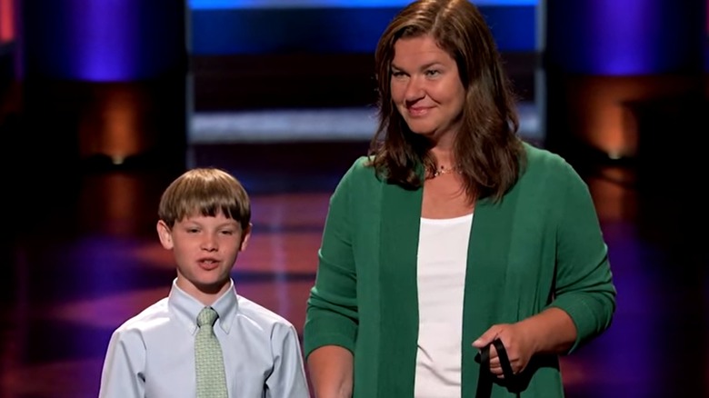 Ryan presents his pitch to the sharks with his mom by his side