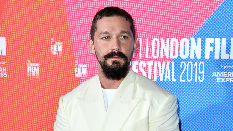 Shia Labeouf posing at Honey Boy premiere