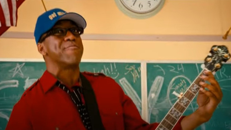 Jaleel White playing a banjo