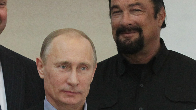 Vladimir Putin and Steven Seagal stand side by side