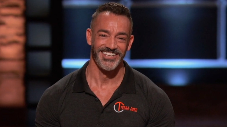 Greg Nigro smiles in a Terra-Core shirt on "Shark Tank" (2019)