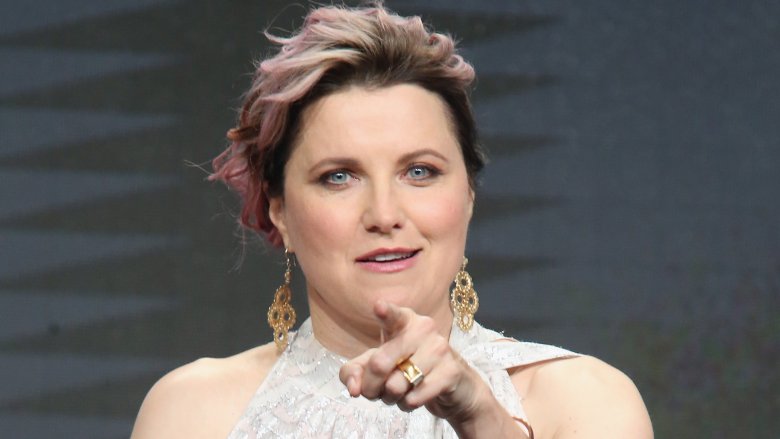 lucy lawless pointing at audience