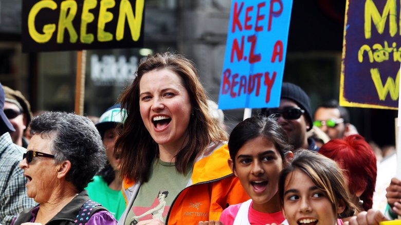 lucy lawless protesting against climate change