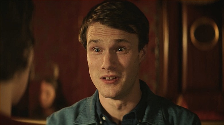 Hugh Skinner with raised eyebrows