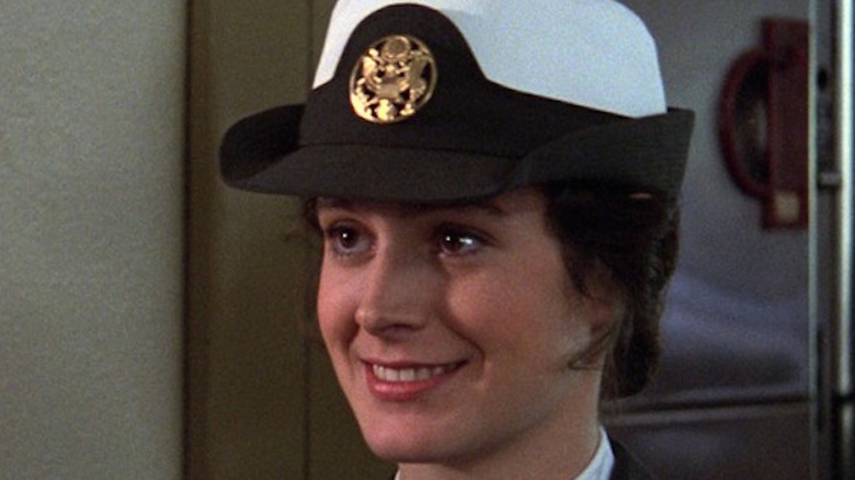 Sean Young smiles