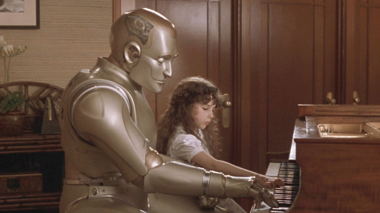 Amanda and Andrew playing the piano 