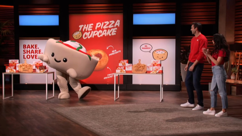 Michelle and Andrea dancing next to Pizza Cupcake mascot