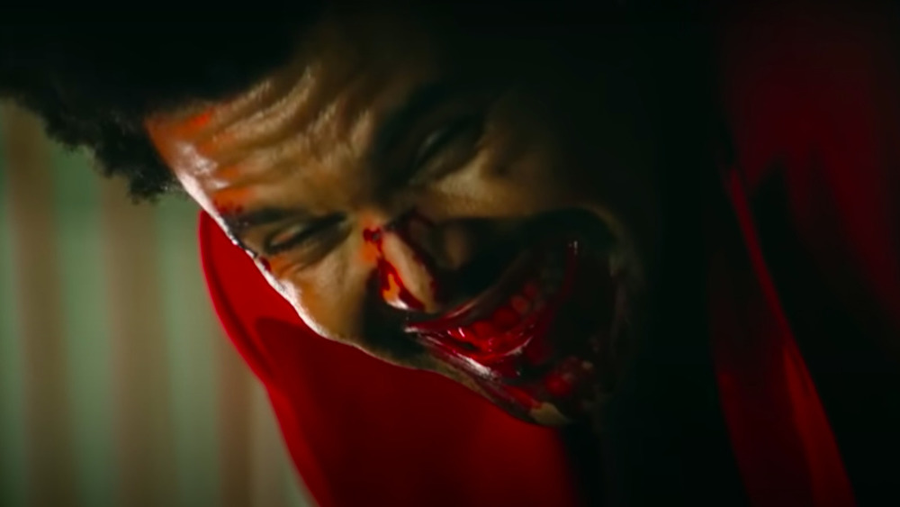 The Weeknd smiling with bloody mouth