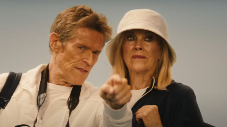 Willem Dafoe points out something to Catherine O'Hara in the Michelob Ultra Super Bowl ad