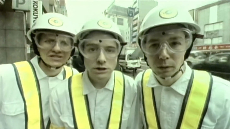 The Beastie Boys wearing Japanese construction uniforms