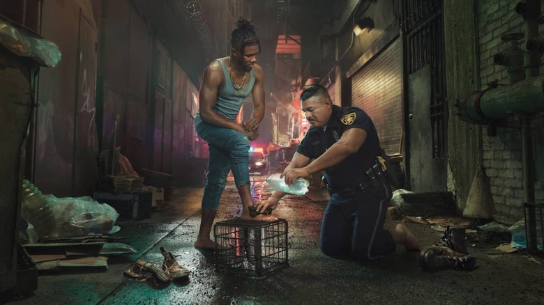 Cop washing man's feet