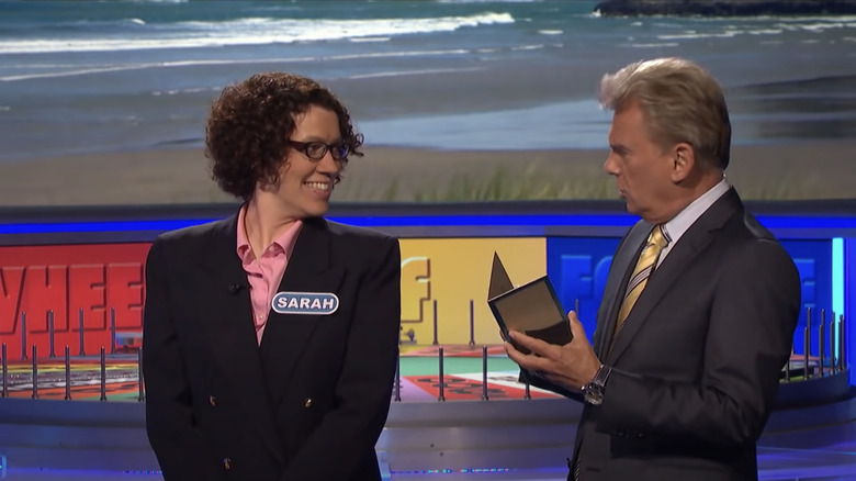 Sarah Manchester smiles at Pat Sajak on Wheel of Fortune