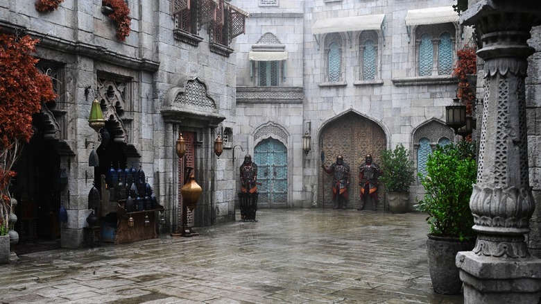 Three guards standing in the rain in Tar Valon