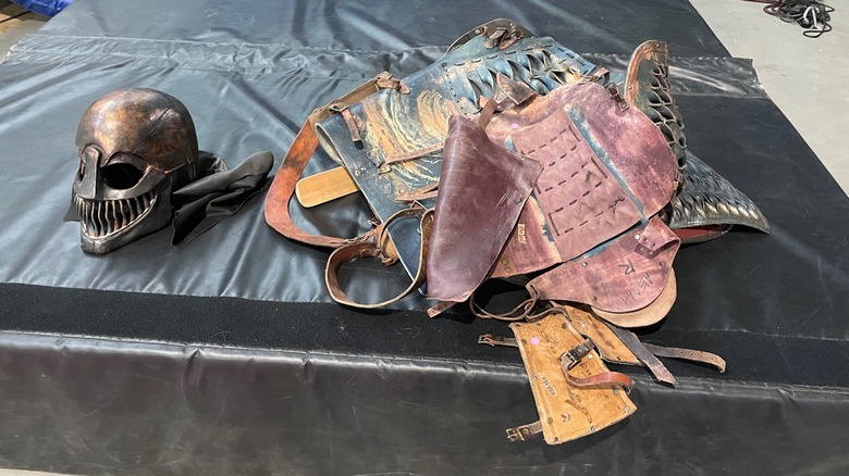 A helmet and set of armor in the stunt studio