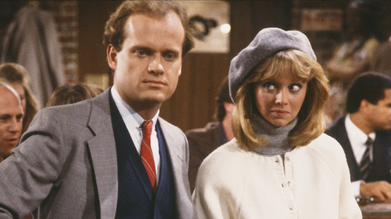 Frasier and Diane looking on