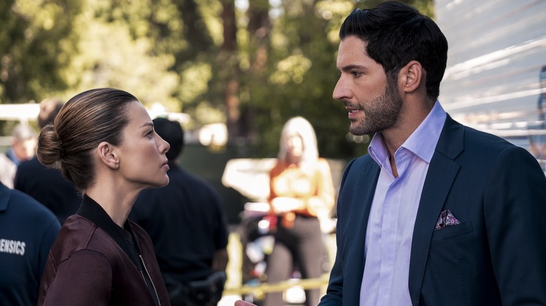 Chloe Decker and Lucifer facing each other