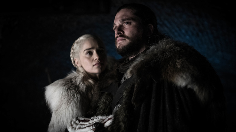 Daenerys Targaryen touching Jon Snow