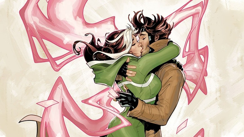 Rogue and Gambit kissing with kinetic energy around