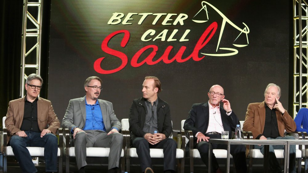 (L-R) Co-creators Peter Gould, Vince Gilligan, actors Bob Odenkirk, Jonathan Banks and Michael McKean onstage under a big sign that says Better Call Saul during an AMC presentation