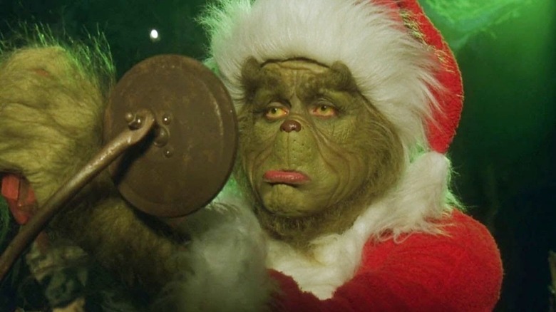 The Grinch dressed as Santa