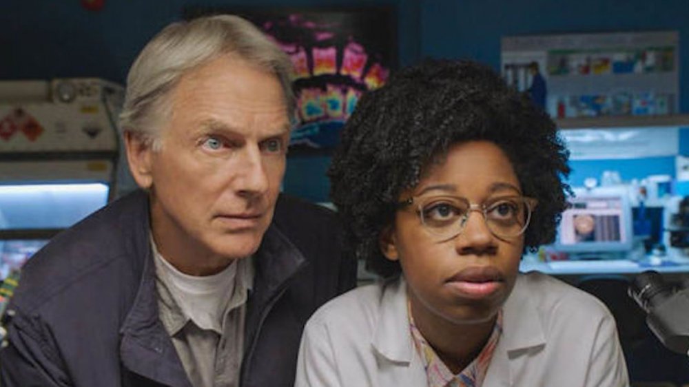 Mark Harmon as Special Agent Leroy Jethro Gibbs and Diona Reasonover as forensic scientist Kasie Hines in NCIS