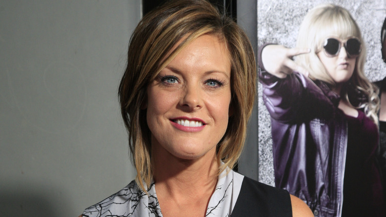 Kelly Hyland smiles at the Pitch Perfect premiere in Los Angeles, California in 2012