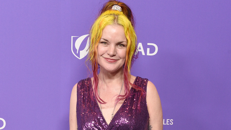 Pauley Perrette smiling with sparkly dress