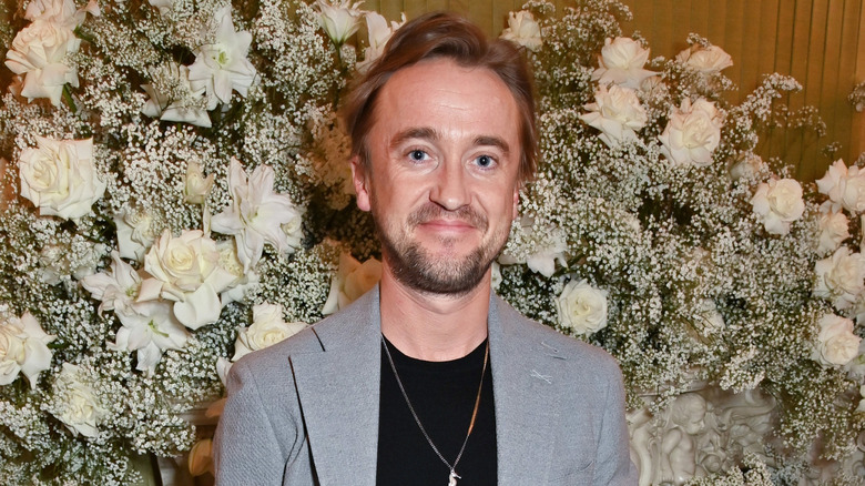 Tom Felton smiling