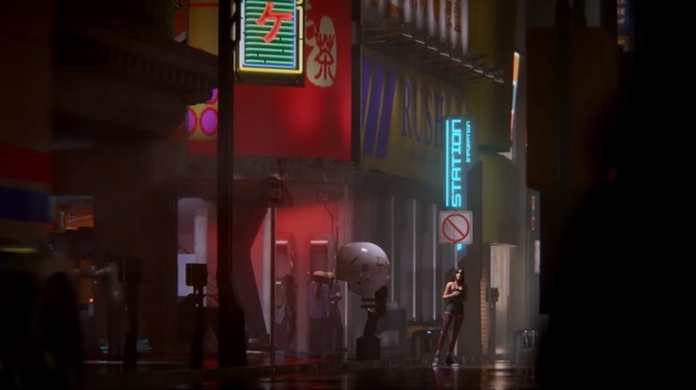 Elle standing in neon-lit street