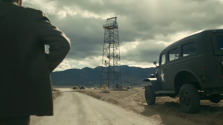 Manhattan Project workers building a steel tower