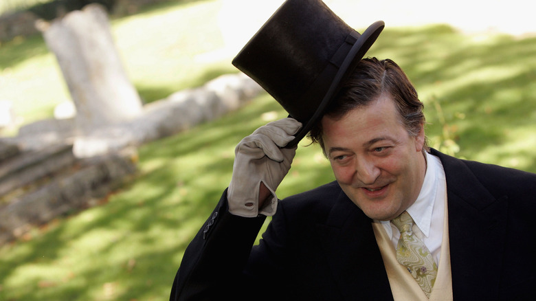 COOLING, UNITED KINGDOM - AUGUST 30: Actor Stephen Fry attends the wedding of musician Jools Holland and Christabel McEwen at St James's Church on August 30, 2005 in Cooling, England. The Archbishop Of Canterbury, Dr Rowan Williams, granted a special licence for the formerly redundant Cooling church to be used. (Photo by Gareth Cattermole/Getty Images)