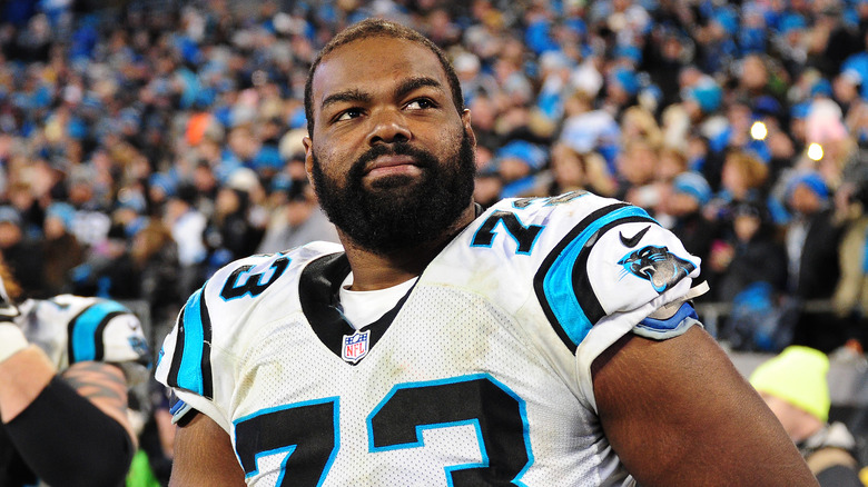 Michael Oher looking into the distance 