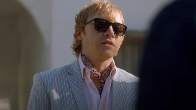 Rupert Grint wearing sunglasses