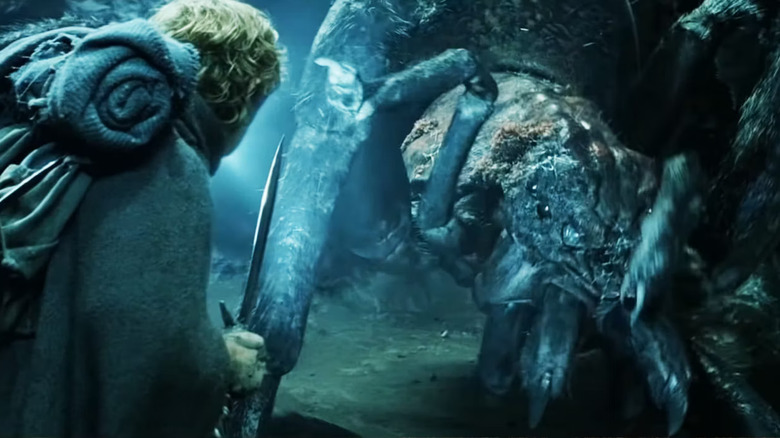 Sam blasts Shelob's eyes with light